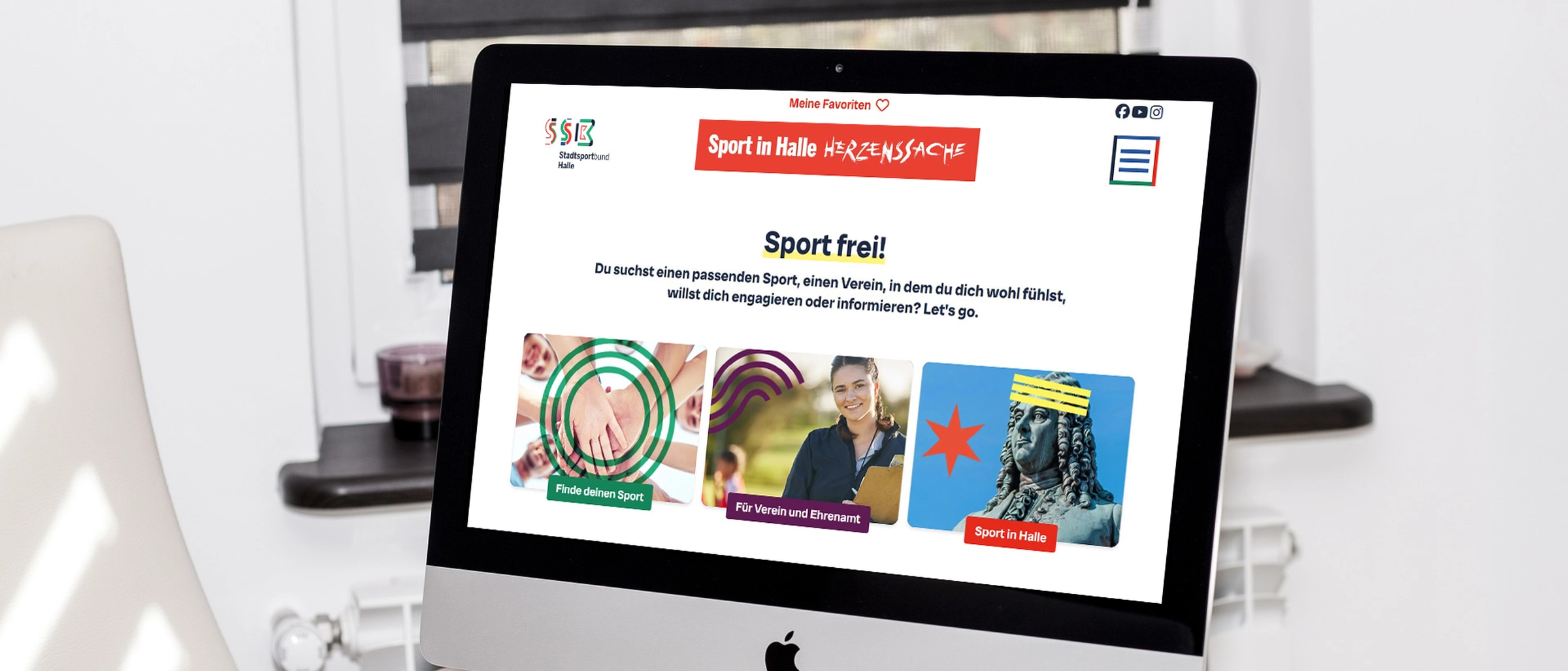 Website Stadtsportbund PC auf Schreibtisch mit Website vom Stadtsportbund